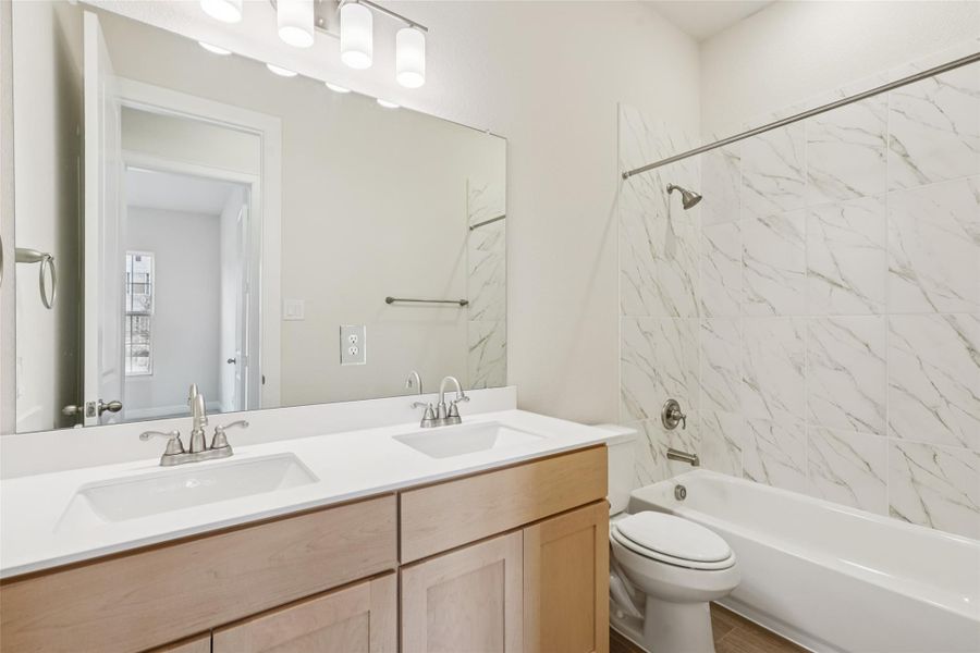 Furnished interior view inside a new home in Sienna 65', Missouri City (Image 10).