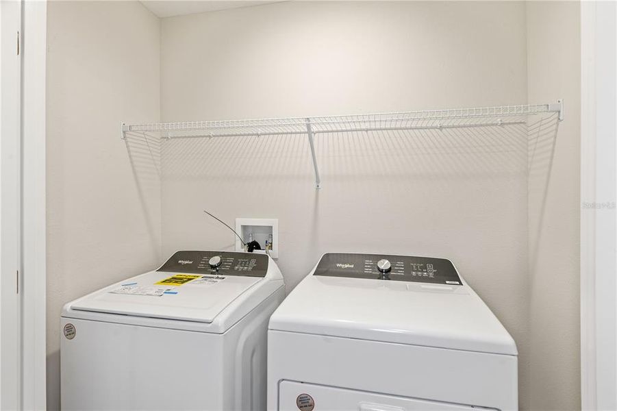 Furnished interior view inside a new home in Grove at Crosswind, Haines City (Image 8).