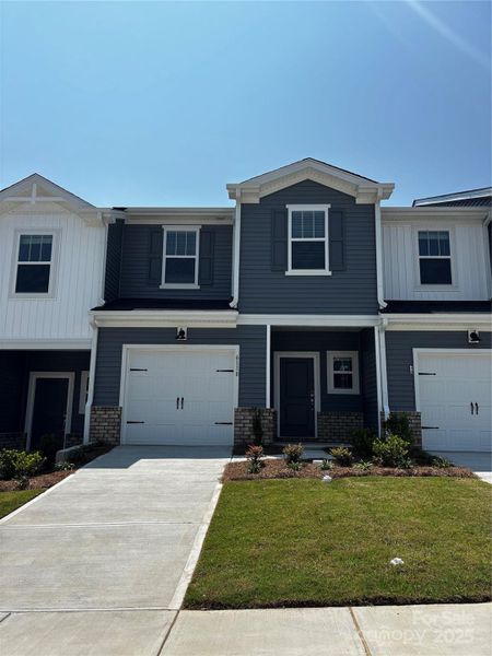 Front exterior of a new home in Galloway Ridge, Charlotte, NC, highlighting curb appeal (Image 1).