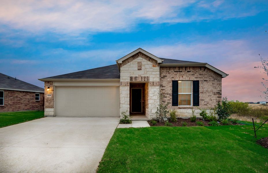 Representative exterior photo of a completed home built from the Serenada by Centex in Cottonwood Creek, Howe, TX (Image 14).