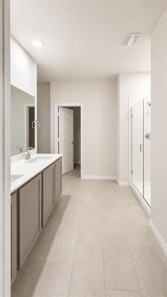 Dual sink vanity with light gray cabinetry and white countertops Dual sink vanity with light gray cabinetry and white countertops