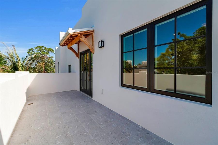 Exterior details and patio area of a home in , Sarasota (Image 25).
