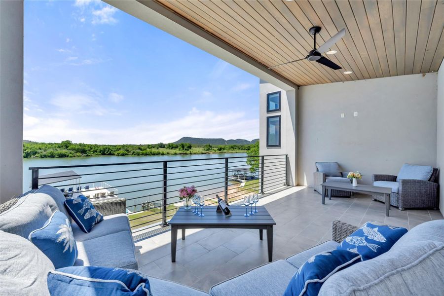 Spacious covered terrace with incredible lake views.