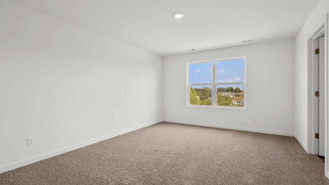 Representative unfurnished interior of a home built from the Holcombe by D.R. Horton in Peachtree Meadows, Rockwall (Image 43).