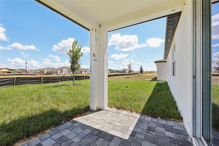 Exterior details and patio area of a home in Crosswinds - Signature Series, Haines City (Image 19).