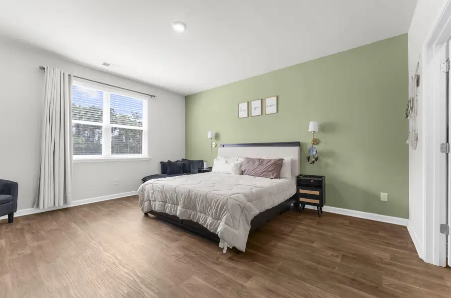 Furnished interior view inside a new home in Pine Hills at Cane Bay, Summerville (Image 37).
