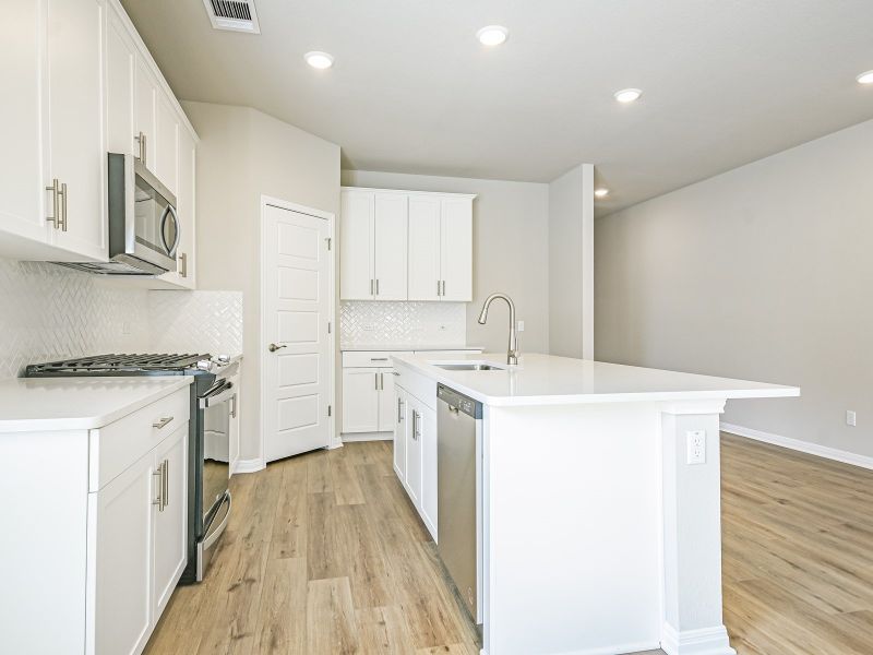 Furnished interior view inside a new home in Butler Farms - Boulevard Collection, Liberty Hill (Image 3).