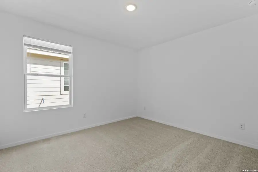 Spacious, unfurnished interior of a new home in Hidden Oasis, San Antonio (Image 16).