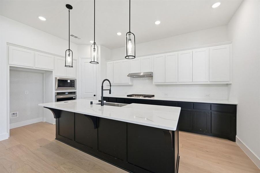 Furnished interior view inside a new home in Wildridge, Oak Point (Image 5). Furnished interior view inside a new home in Wildridge, Oak Point (Image 5).