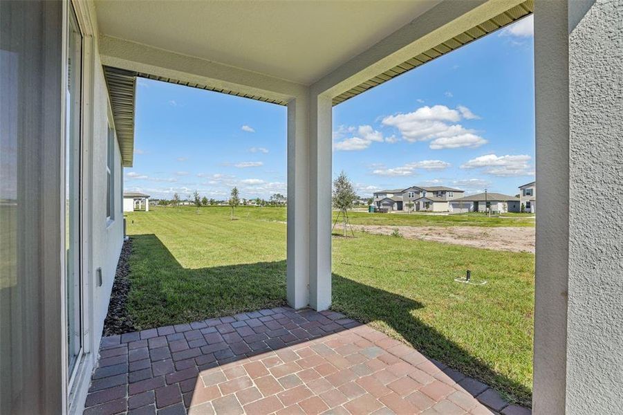 Exterior details and patio area of a home in The Reserve at Twin Lakes, St. Cloud (Image 27).