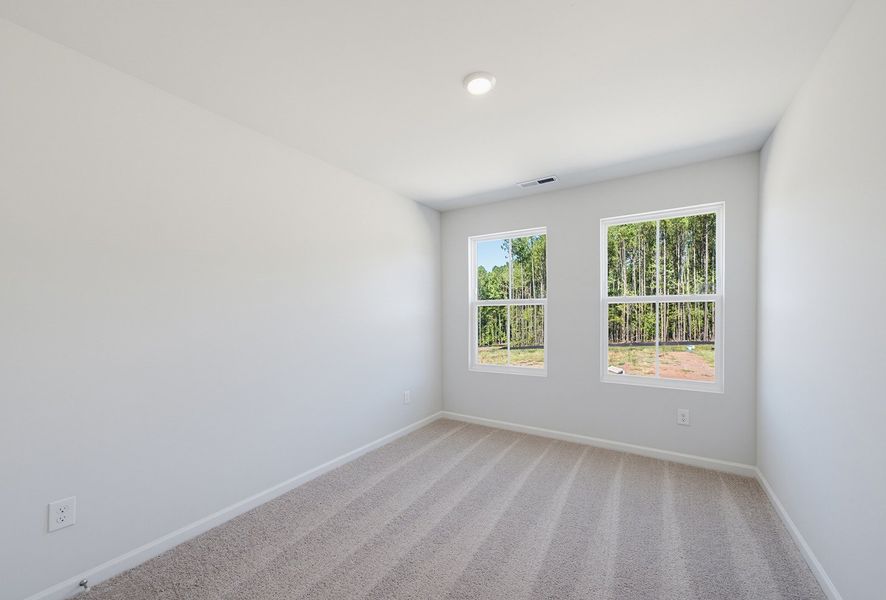 Spacious, unfurnished interior of a new home in Sweetbrier, Durham (Image 27).