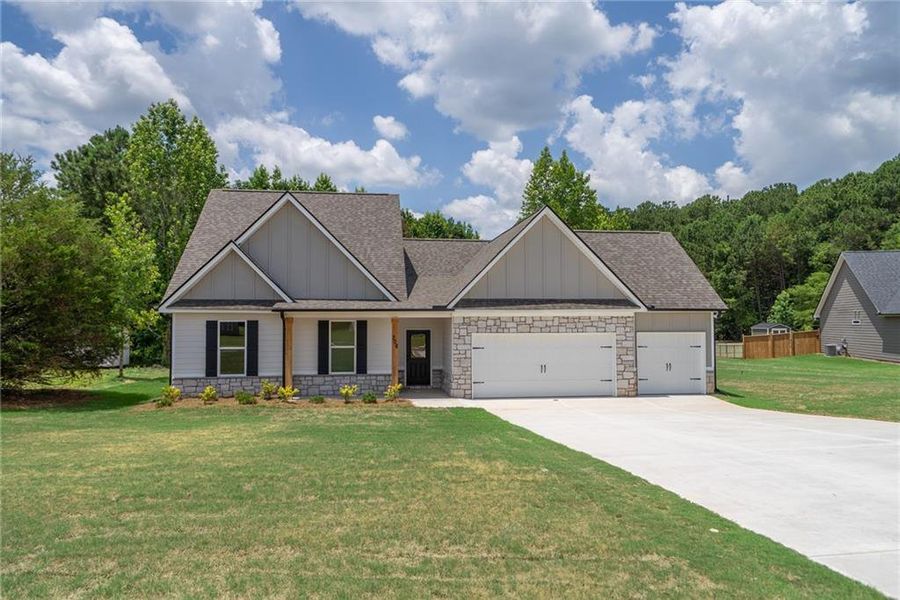 Front exterior of a new home in , Good Hope, GA, highlighting curb appeal (Image 2). Front exterior of a new home in , Good Hope, GA, highlighting curb appeal (Image 2).