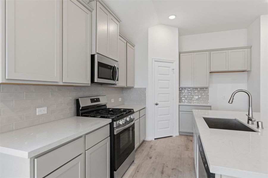 Furnished interior view inside a new home in Westland Ranch, League City (Image 7).
