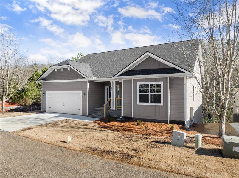 Front exterior of a new home in Magnolia Villas, Cornelia, GA, highlighting curb appeal (Image 18).