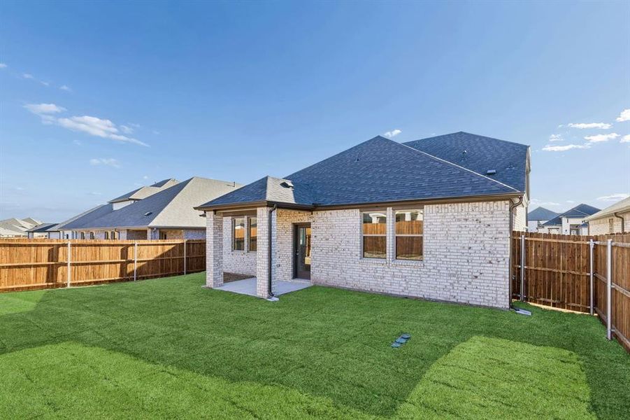 Covered Patio in the Haylee home plan by Trophy Signature Homes - REPRESENTATIVE PHOTO Covered Patio in the Haylee home plan by Trophy Signature Homes - REPRESENTATIVE PHOTO
