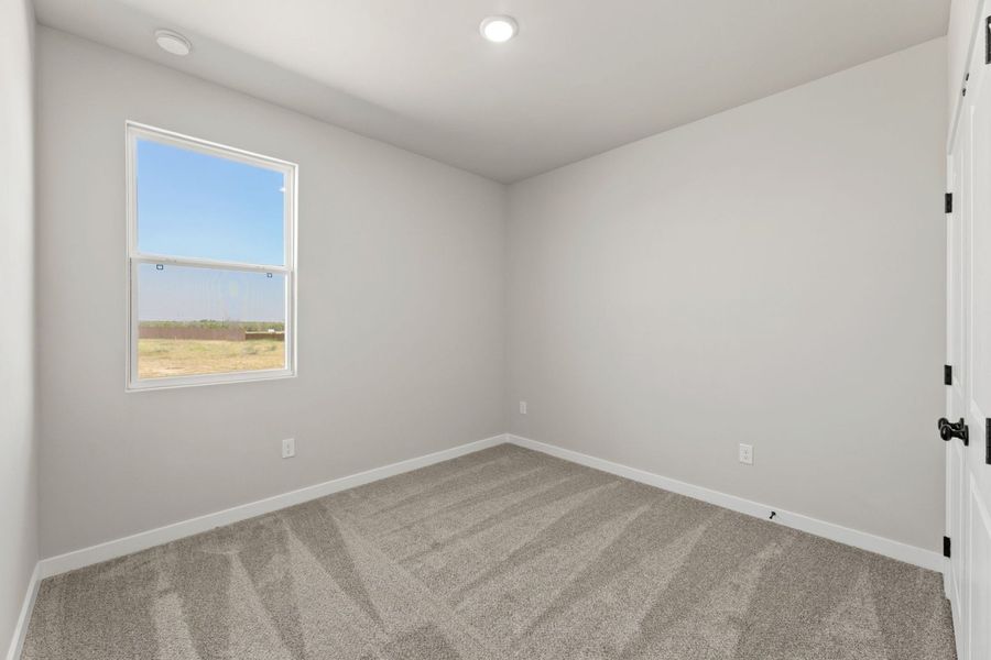 Representative unfurnished interior of a home built from the Tularosa by Hakes Brothers in Hickory Ridge, Elmendorf (Image 16).