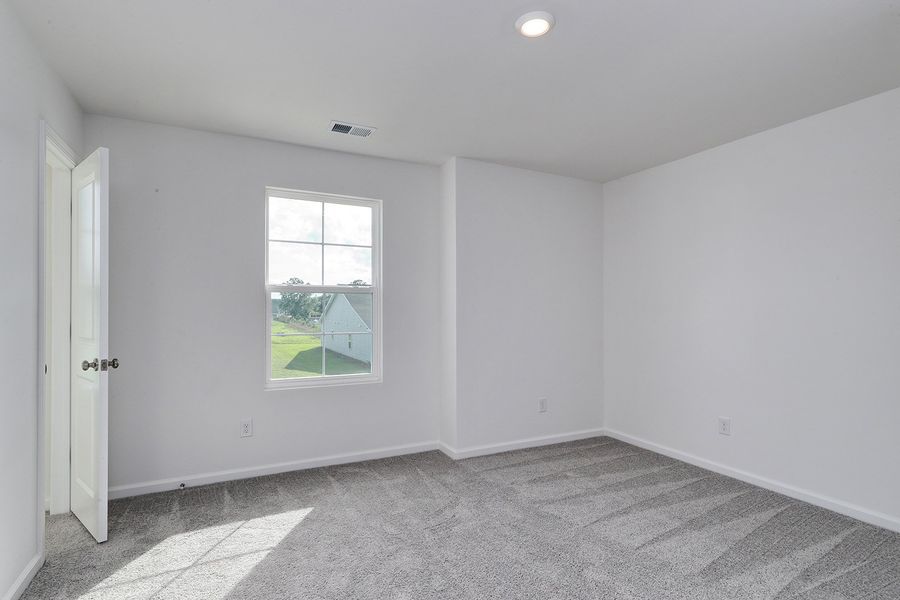 Spacious, unfurnished interior of a new home in Garden Grove, Conway (Image 43).