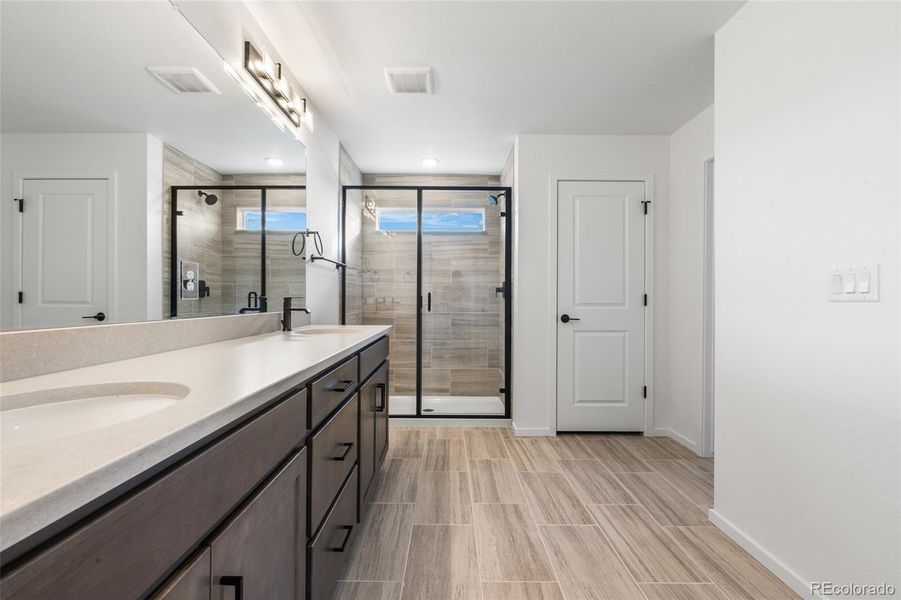 Furnished interior view inside a new home in Harvest Crossing, Aurora (Image 13).