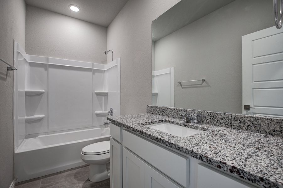 Representative furnished interior of a home built from the The Asheville I by Davidson Homes LLC in Bricewood, San Antonio (Image 10).