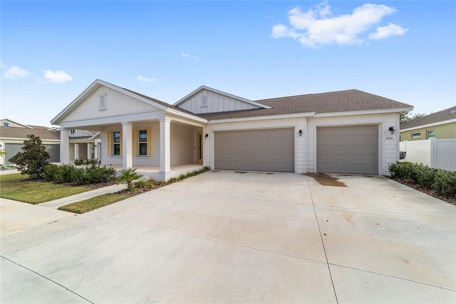 Front exterior of a new home in Calesa Township, Ocala, FL, highlighting curb appeal (Image 31).