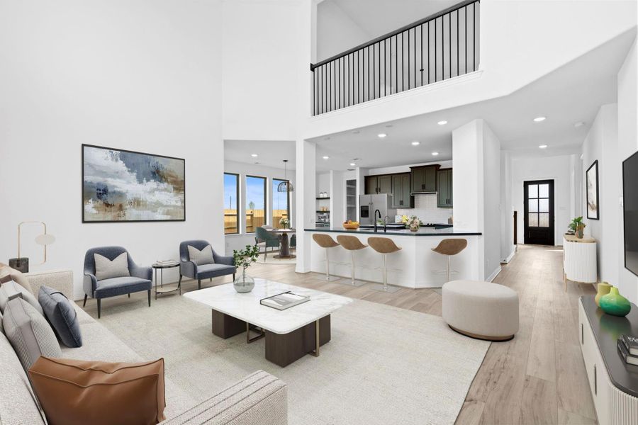 Bright and airy living room with soaring ceilings and large windows that create an open, inviting atmosphere.