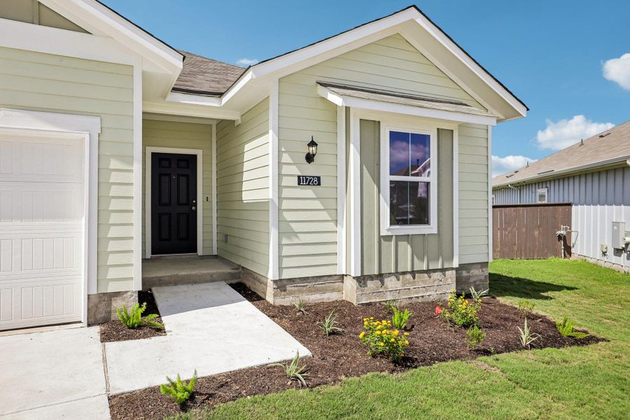 Exterior details and patio area of a home in Cloverleaf, Austin (Image 17).