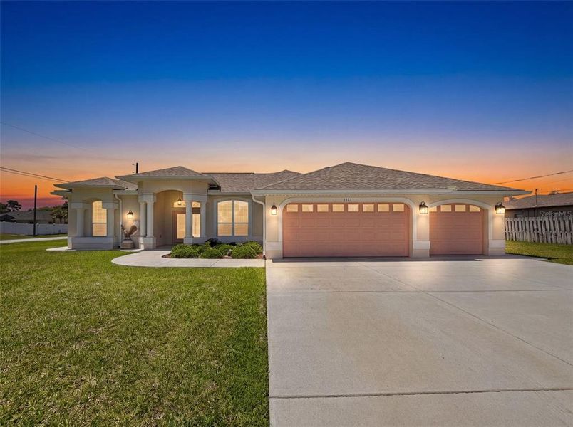 Front exterior of a new home in , Spring Hill, FL, highlighting curb appeal (Image 24).