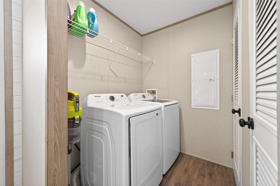 Dedicated utility room with washer and dryer connections and functional space for everyday use. Dedicated utility room with washer and dryer connections and functional space for everyday use.