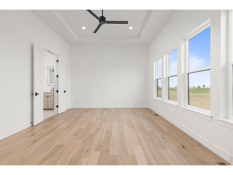 Spacious, unfurnished interior of a new home in RainDance, Windsor (Image 20).