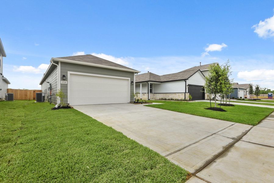 Front exterior of a home in the Barrett Crossing community, located in Crosby, TX (Image 10).