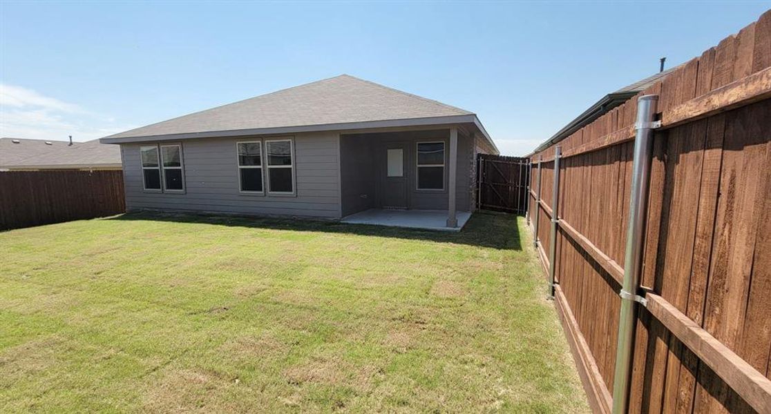 Front exterior of a new home in Highlands at Chapel Creek, Fort Worth, TX, highlighting curb appeal (Image 13). Front exterior of a new home in Highlands at Chapel Creek, Fort Worth, TX, highlighting curb appeal (Image 13).