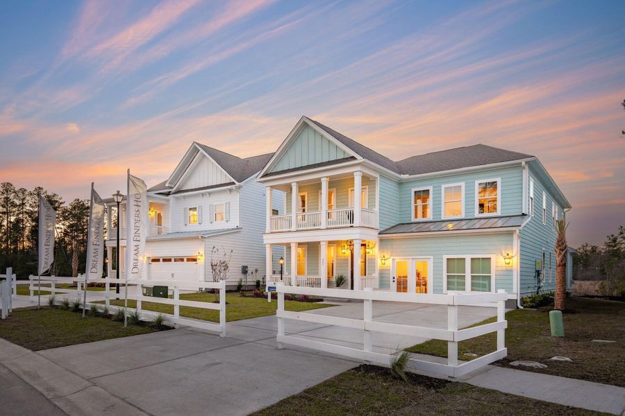 Front exterior of a new home in Cherrywood Estates, Summerville, SC, highlighting curb appeal (Image 1). Front exterior of a new home in Cherrywood Estates, Summerville, SC, highlighting curb appeal (Image 1).