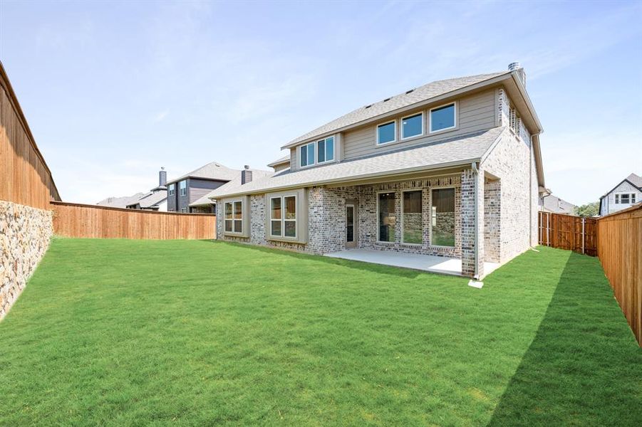 Front exterior of a new home in Mockingbird Hills 60-65, Joshua, TX, highlighting curb appeal (Image 24).
