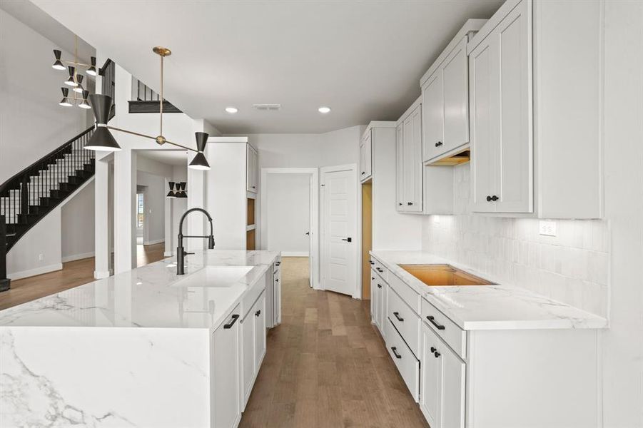 *REPRESENTATION PHOTO* Open Island Kitchen With a Waterfall Edge