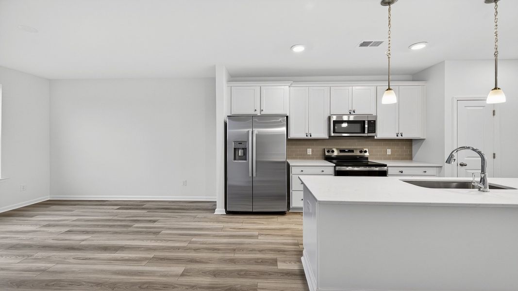 Furnished interior view inside a new home in Clear Springs Townhomes, North Charleston (Image 5).