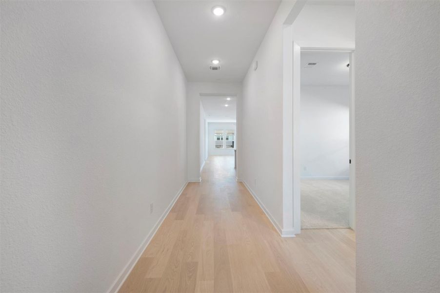 Spacious, unfurnished interior of a new home in Heritage, Dripping Springs (Image 24).