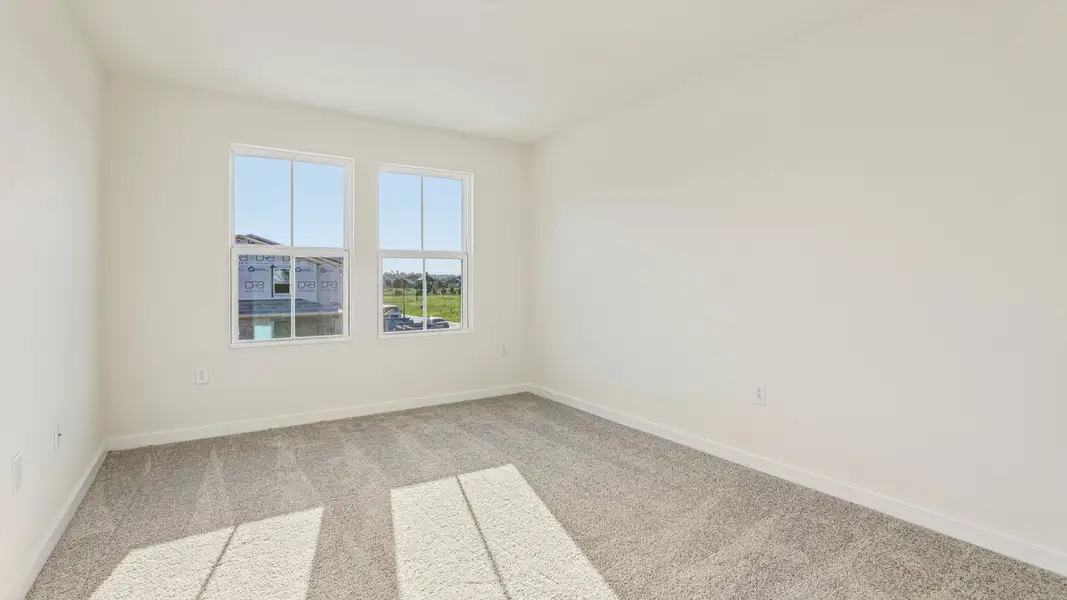 Furnished interior view inside a new home in Cyrene at Harmony, St. Cloud (Image 22).