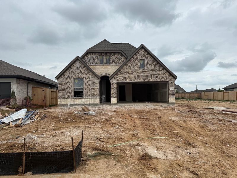 In-progress construction of a new home in Candela, Richmond, TX (Image 6).