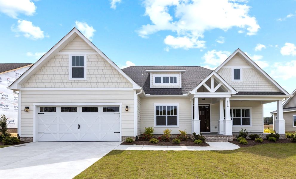 Representative exterior photo of a completed home built from the Haddock by Bill Clark Homes in Laurel Oaks, Greenville, NC (Image 24).