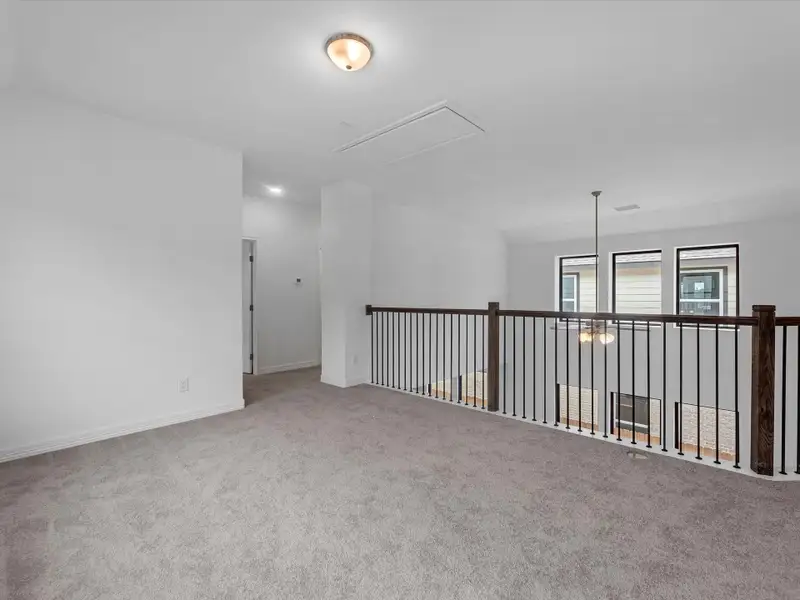 Upstairs loft. Sample product photo. Actual exterior and interior selections may vary by homesite. Photo may be virtually staged.