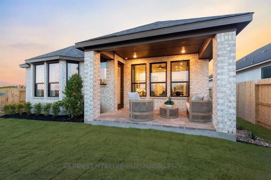 Exterior details and patio area of a home in Treeline, Justin (Image 22).
