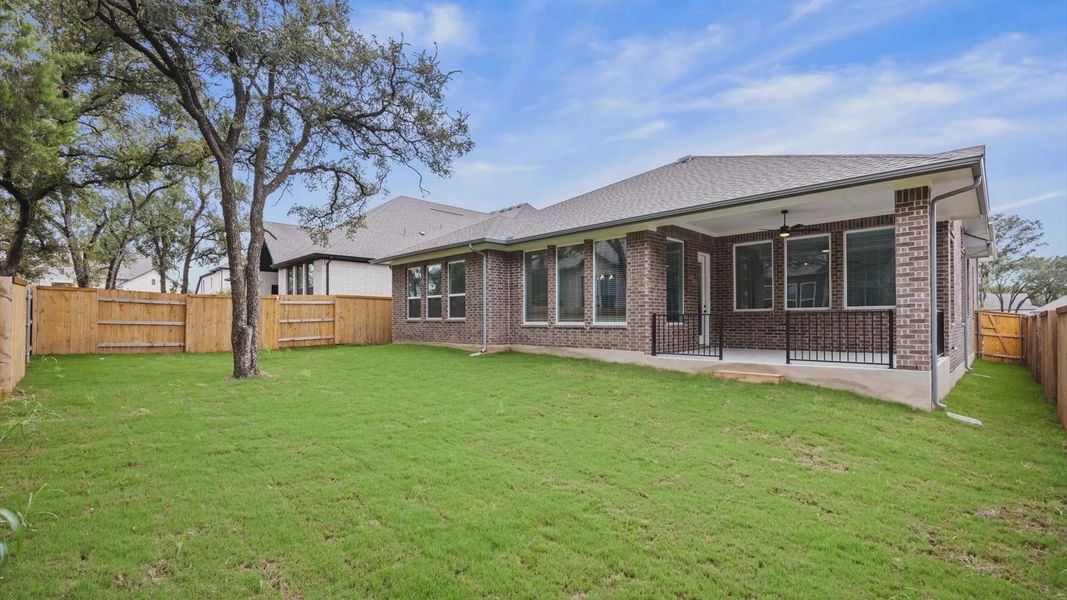 Exterior details and patio area of a home in 6 Creeks, Kyle (Image 3).