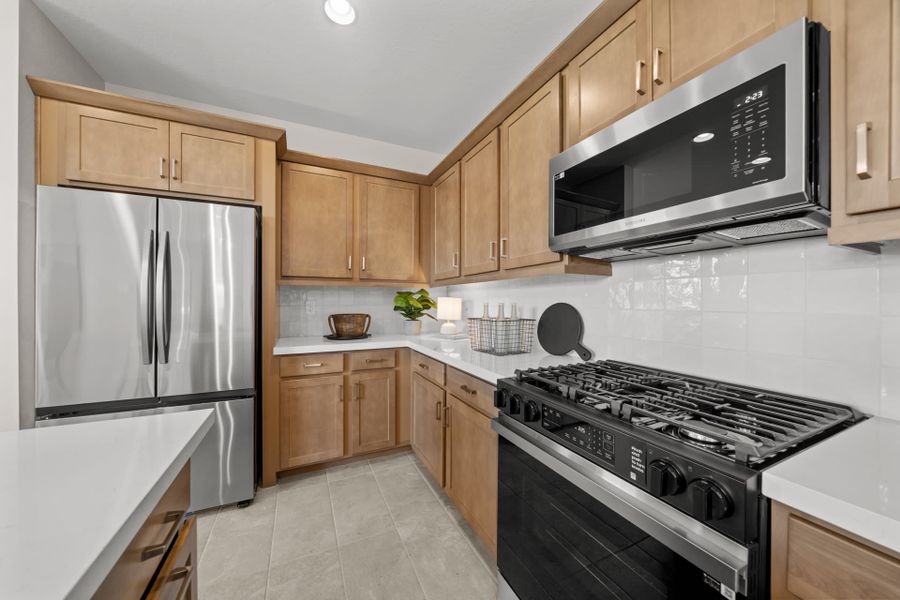 Kitchen | Radiance Floorplan | Elara at Moonlight | New Homes in Maricopa, AZ by Landsea Homes Kitchen | Radiance Floorplan | Elara at Moonlight | New Homes in Maricopa, AZ by Landsea Homes