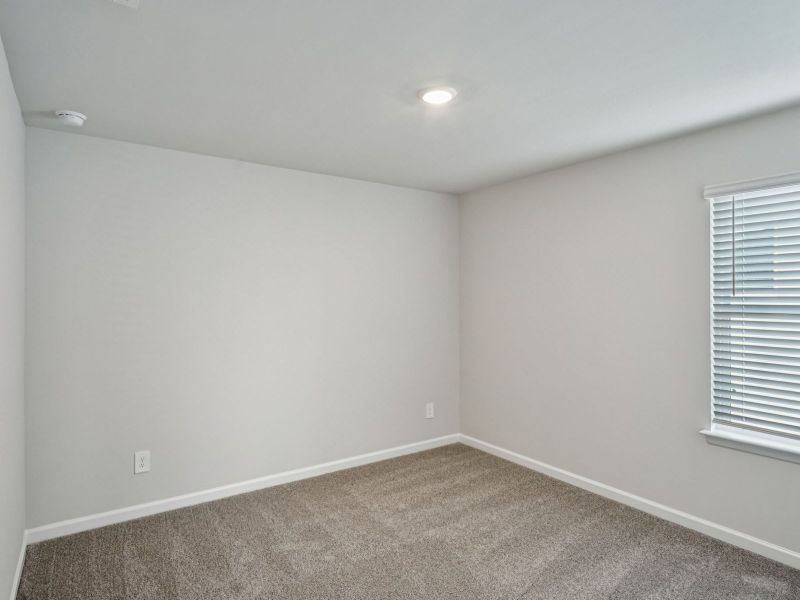 Secondary Bedroom in the Thompson floorplan at a Meritage Homes community in Atlanta, GA.