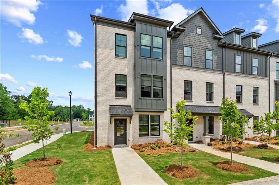 Front exterior of a new home in Silverock, McDonough, GA, highlighting curb appeal (Image 21).
