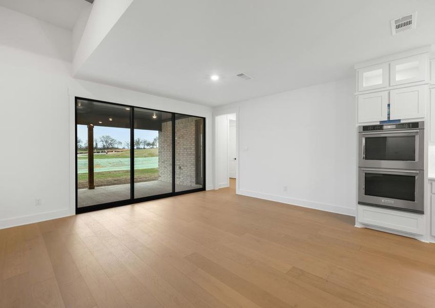 The open breakfast area has plenty of natural light from the sliding back doors.