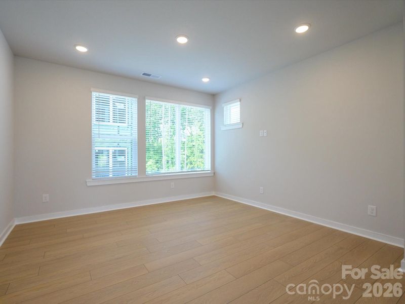 Spacious, unfurnished interior of a new home in Central Living at Craig, Charlotte (Image 21).