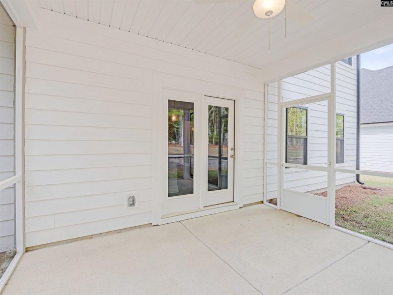 Exterior details and patio area of a home in Collins Cove, Chapin (Image 19). Exterior details and patio area of a home in Collins Cove, Chapin (Image 19).