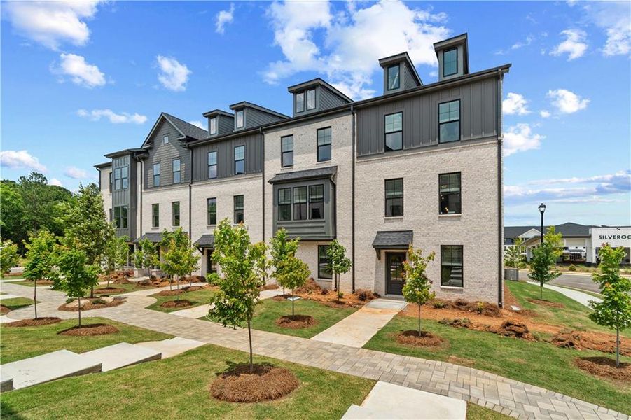 Front exterior of a new home in Silverock, McDonough, GA, highlighting curb appeal (Image 22).
