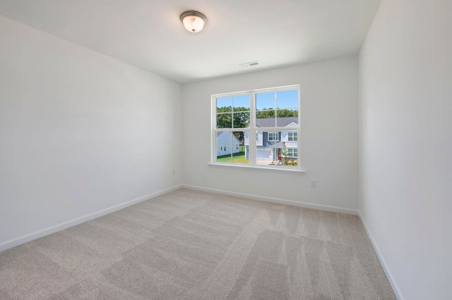 Spacious, unfurnished interior of a new home in Providence Creek, Fuquay Varina (Image 26).
